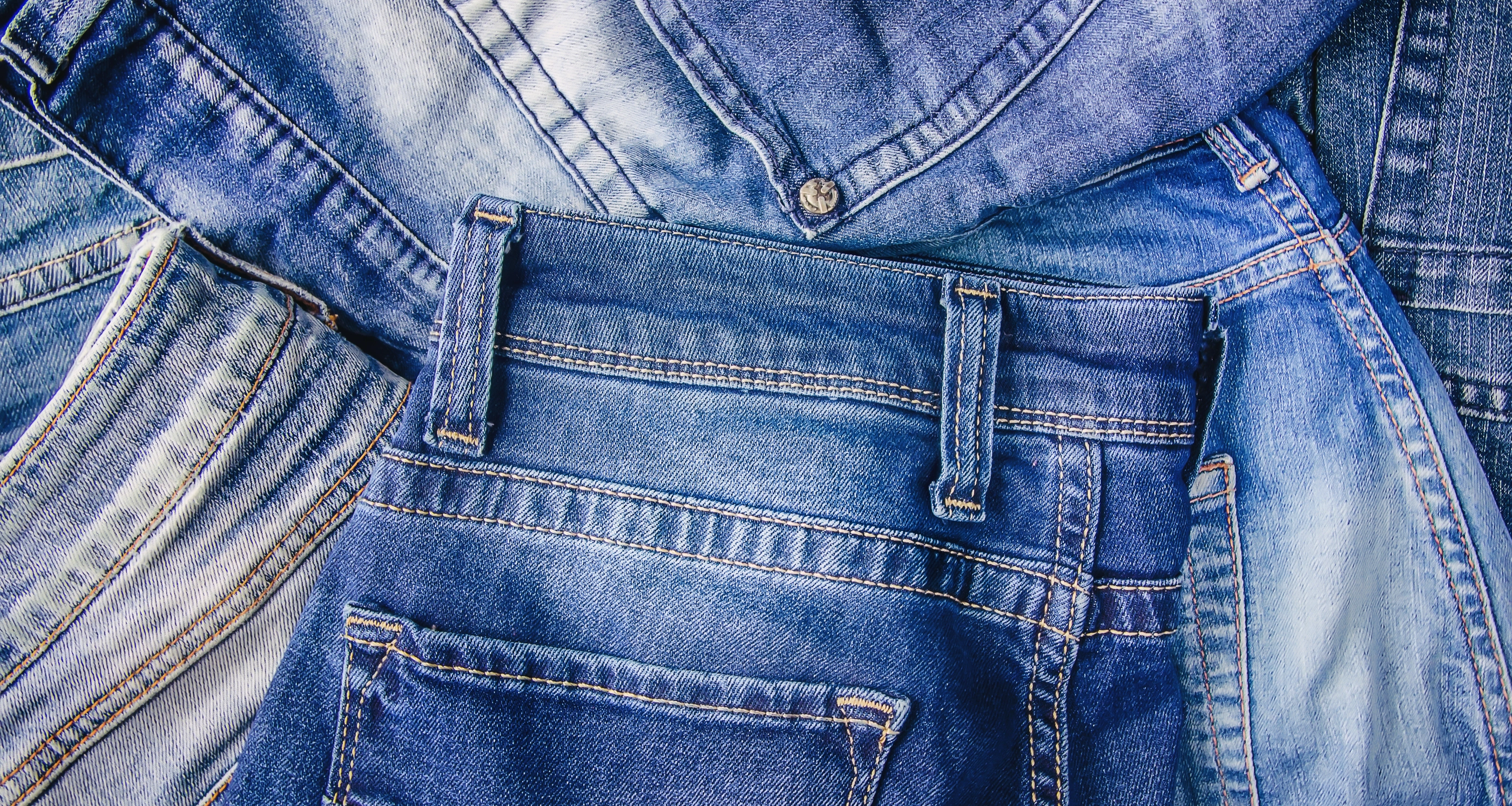 1432607754 Jeans. Stylish clothes. Selective focus Shopping time Nature